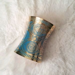 Gold tone metal cuff
